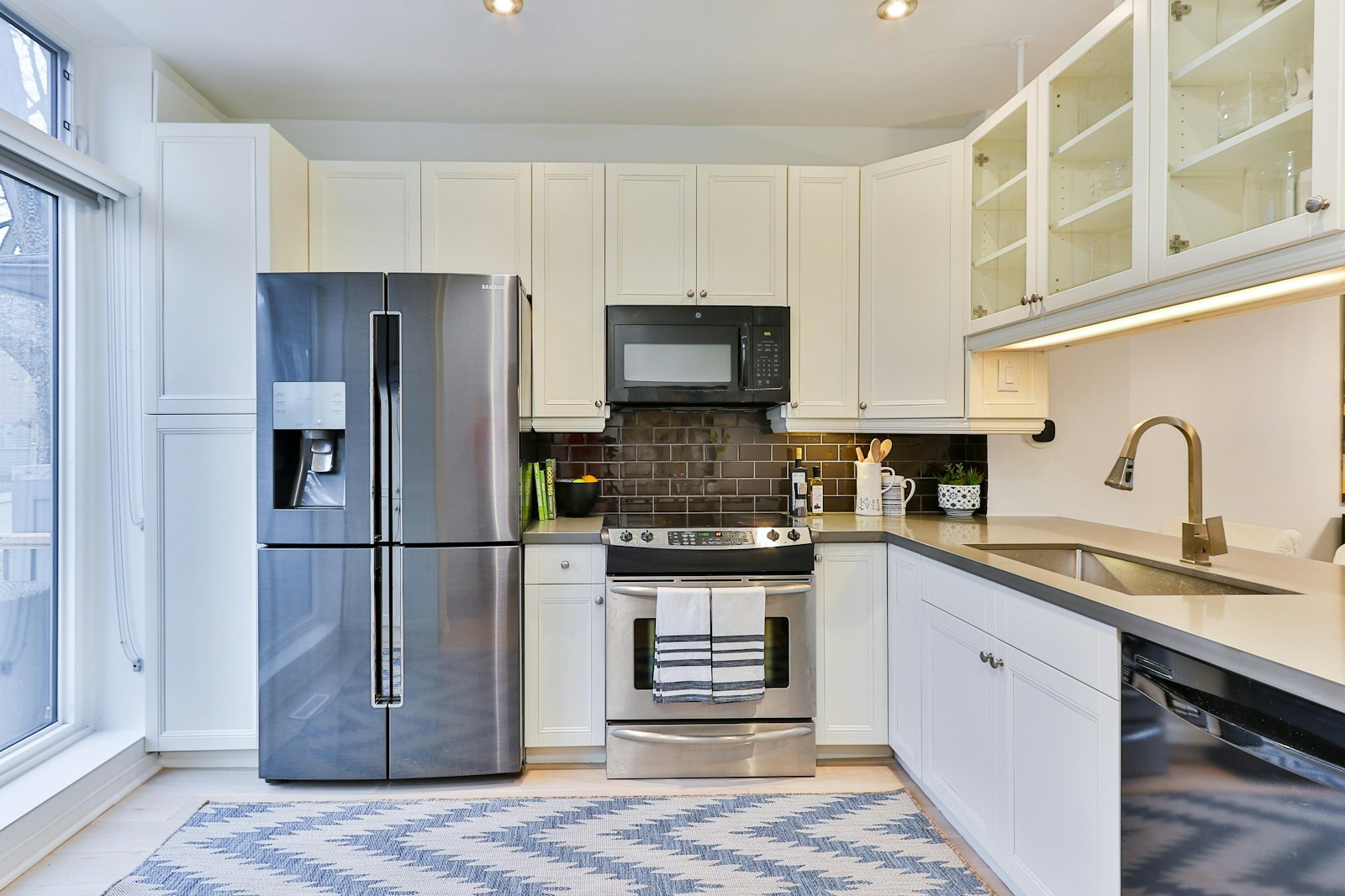 A bright kitchen with stainless steel appliances